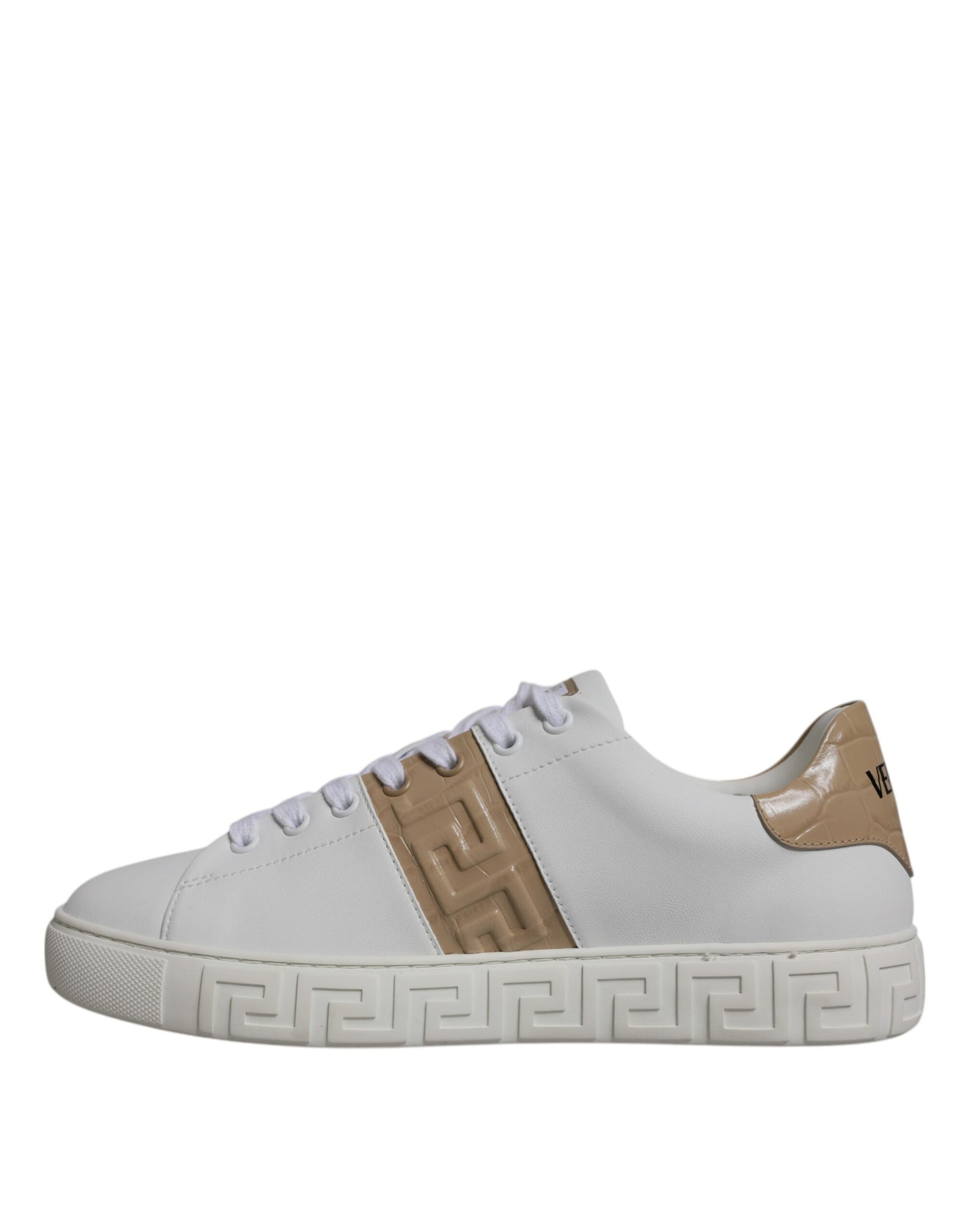 White sneaker with brown accents and a Greek key design on the side