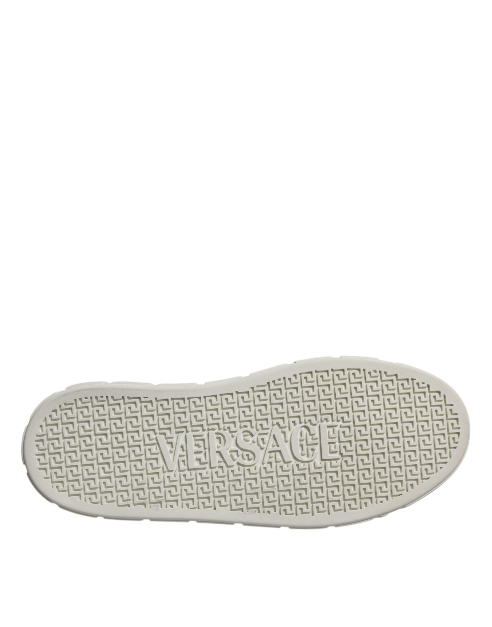 White shoe with logo on bottom