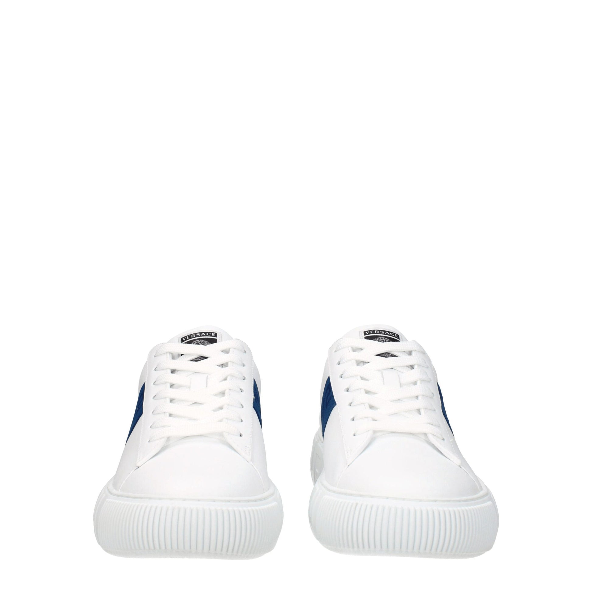 Pair of white leather low top sneakers with blue accents, featuring a chunky sole and brand logo on side