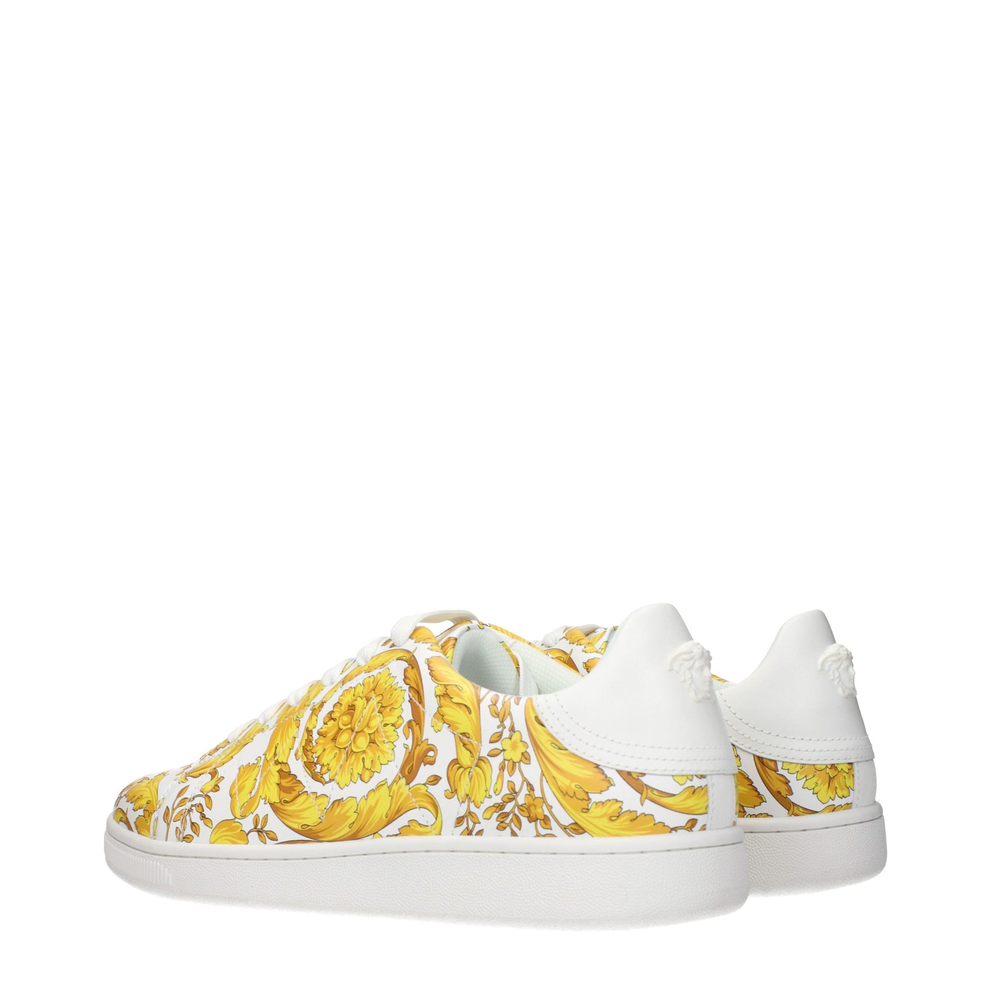 Yellow floral patterned sneakers with white soles