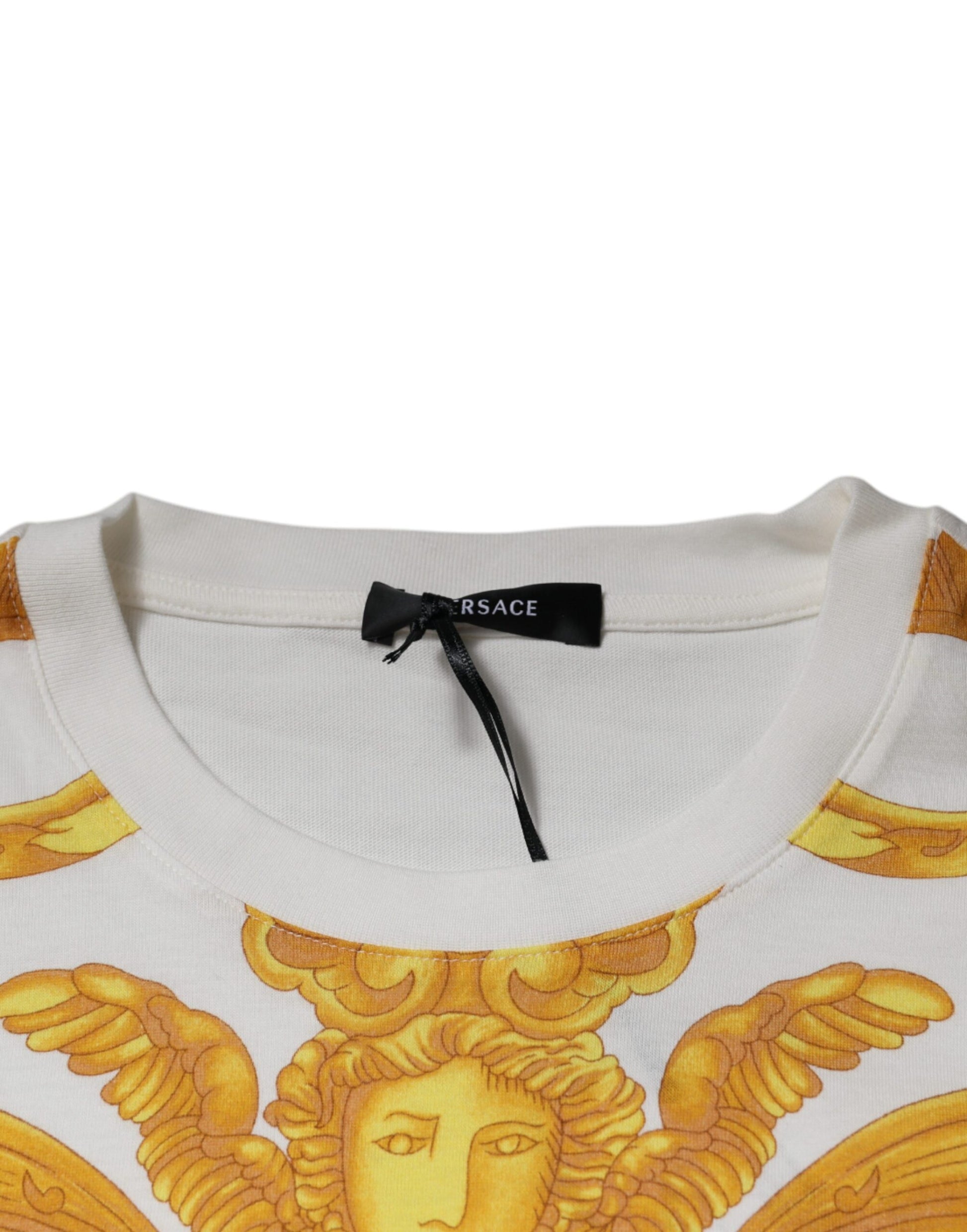 White long sleeve shirt with golden angel design on front