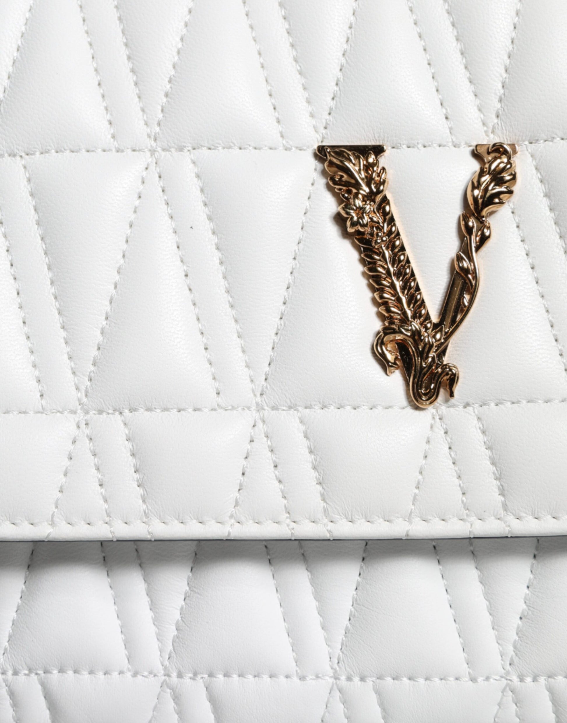 White quilted leather handbag with gold V logo on front