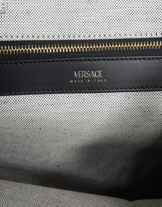 Zippered leather wallet with gold accents