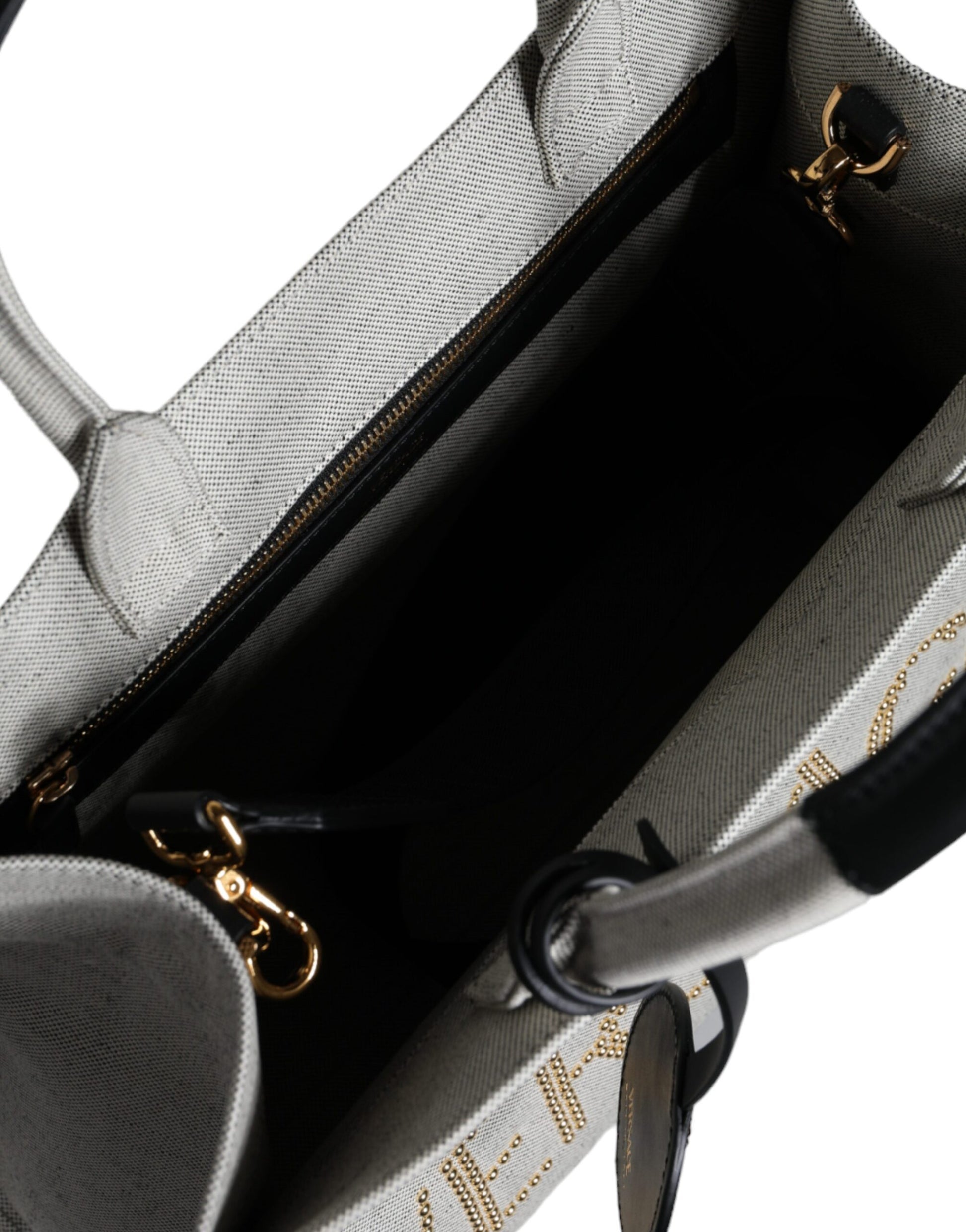 Grey and black purse with gold accents