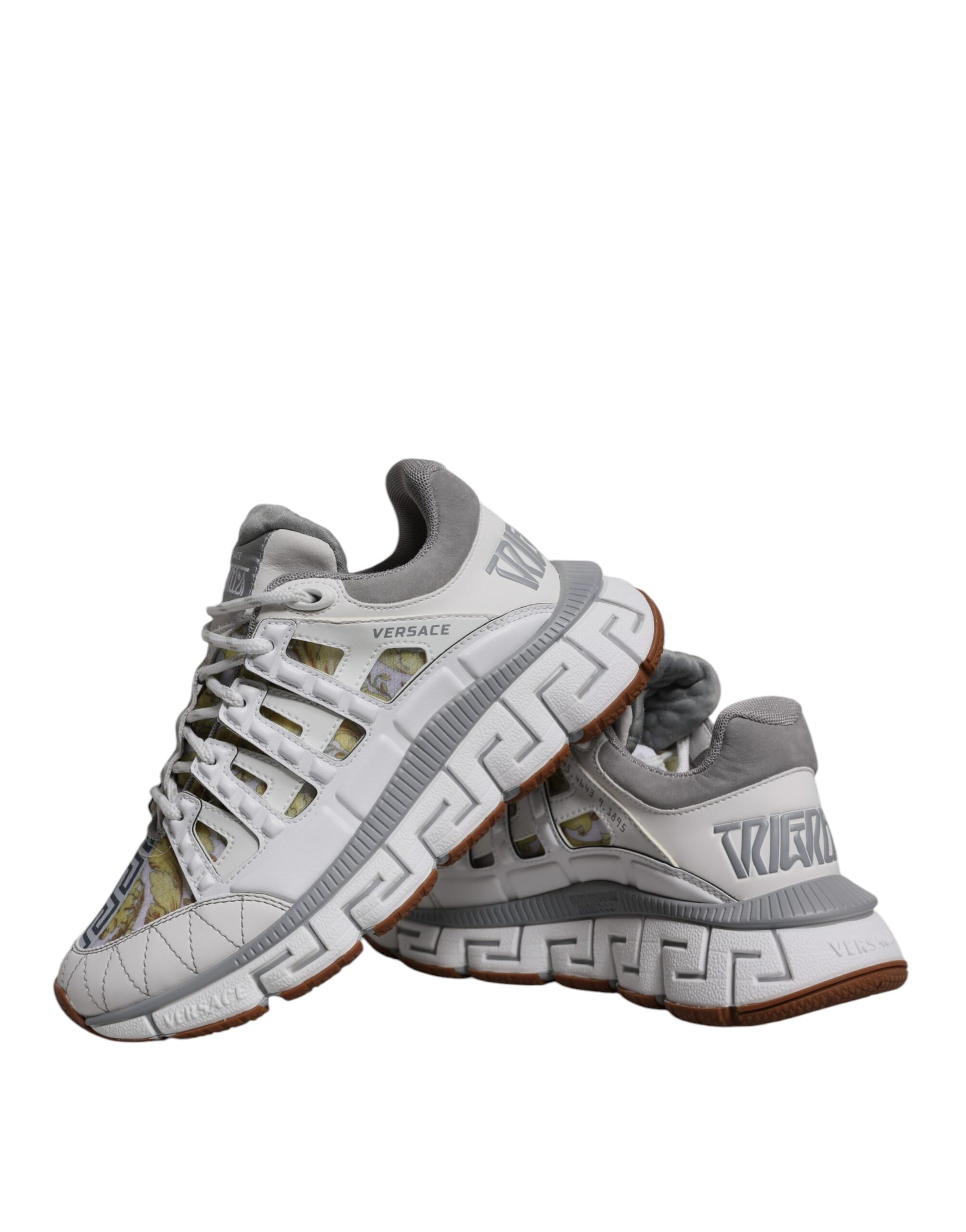 Pair of sneakers with white and grey color scheme