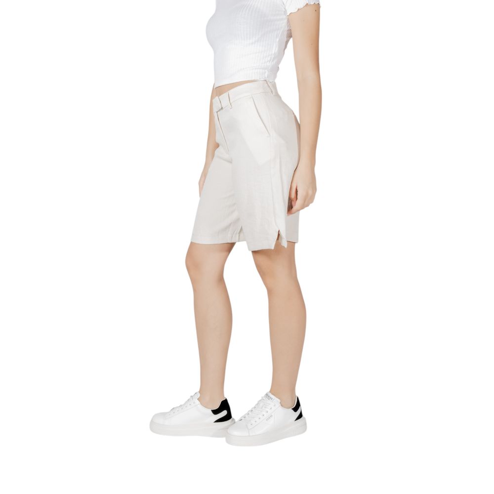 A pair of beige viscose bermuda shorts with a high waist and cropped length