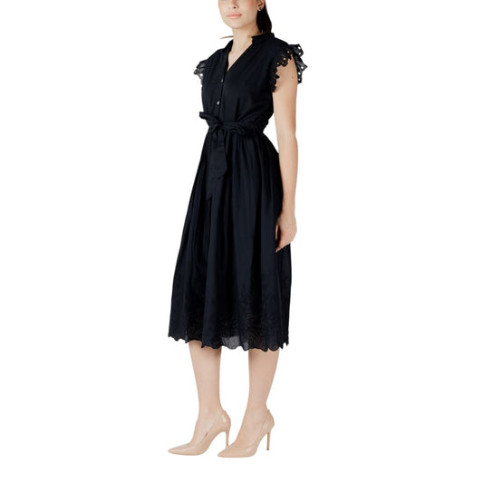 A black midi dress with lace detailing on the bodice