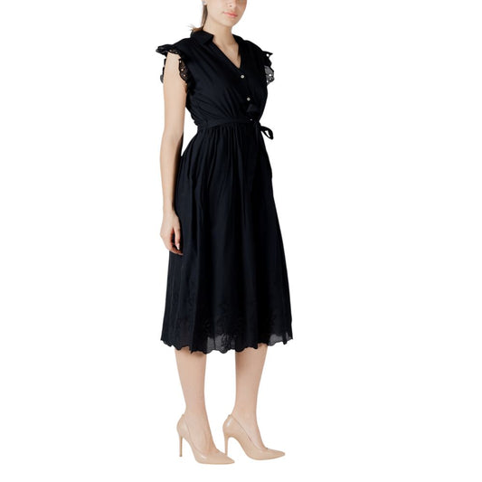 A black midi dress with lace detailing on the bodice