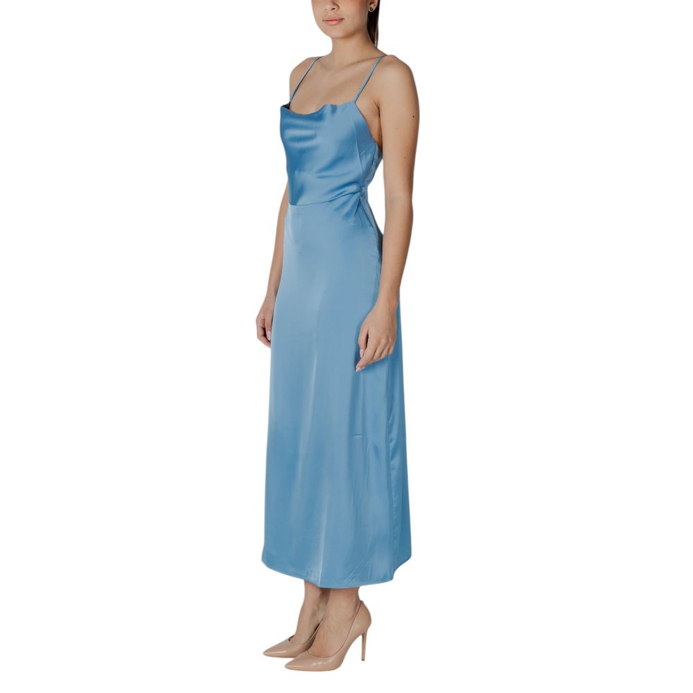 A long turquoise dress with a sleeveless design and a fitted waist, made of polyester
