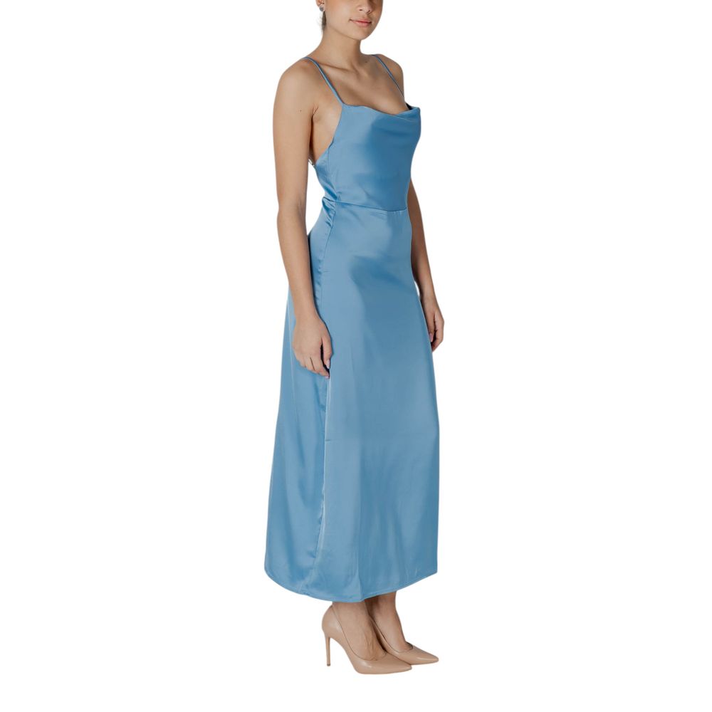 A long turquoise dress with a sleeveless design and a fitted waist, made of polyester