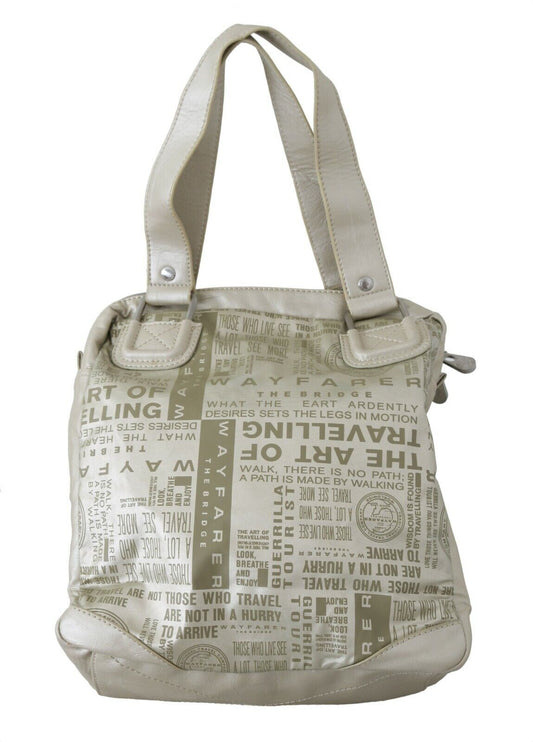Large tan purse with words on side