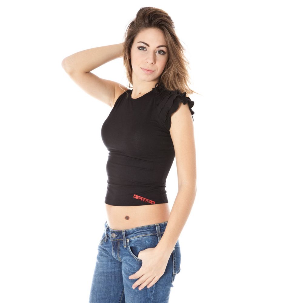 Woman wearing black tank top and jeans